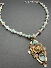 Load image into Gallery viewer, Bronze lion with aquamarine