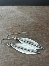 Load image into Gallery viewer, Stamped silver leaf earrings