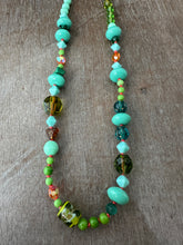 Load image into Gallery viewer, Vintage glass bead silk knotted necklace in greens and oranges