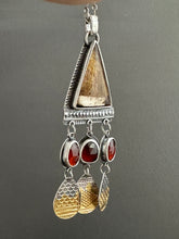 Load image into Gallery viewer, Golden rutilated quartz with garnets.