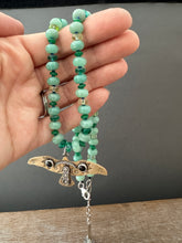 Load image into Gallery viewer, Bronze and silver stamped bird on hand knotted silk and gemstone necklace