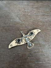 Load image into Gallery viewer, Bronze and silver stamped bird pendant with dark green tourmalines