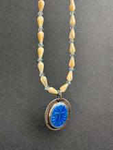 Load image into Gallery viewer, Enameled cross on a beaded mother of pearl and crystal necklace.