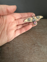 Load image into Gallery viewer, Bronze and silver stamped bird pendant with pink garnet