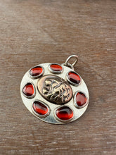 Load image into Gallery viewer, Bronze lion with 7 garnets