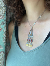 Load image into Gallery viewer, Golden rutilated quartz with garnets.