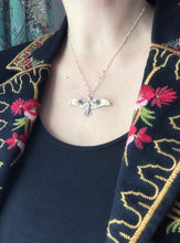 Load image into Gallery viewer, Bronze and silver stamped bird pendant with dark green tourmalines