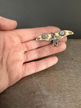 Load image into Gallery viewer, Bronze and silver stamped bird brooch with garnet