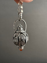 Load image into Gallery viewer, Vintage crystal and carnelian dragon egg medallion