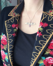 Load image into Gallery viewer, Bronze and silver stamped bird pendant with pink garnet