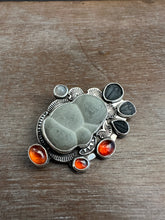 Load image into Gallery viewer, Fairy stone Pendant/Brooch with trilobites and garnets