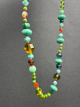 Load image into Gallery viewer, Vintage glass bead silk knotted necklace in greens and oranges
