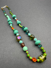 Load image into Gallery viewer, Vintage glass bead silk knotted necklace in greens and oranges