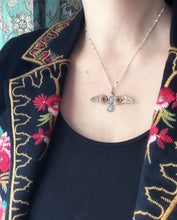Load image into Gallery viewer, Bronze and silver stamped bird pendant with garnets