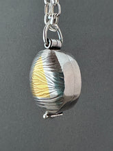 Load image into Gallery viewer, Textured oval flower locket.