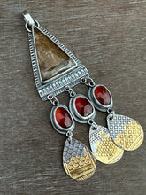 Load image into Gallery viewer, Golden rutilated quartz with garnets.