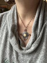 Load image into Gallery viewer, Fossilized walrus and garnets pendant.