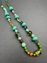 Load image into Gallery viewer, Vintage glass bead silk knotted necklace in greens and oranges