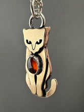 Load image into Gallery viewer, Bronze Kitty Pet with garnet