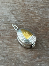 Load image into Gallery viewer, Textured oval flower locket.