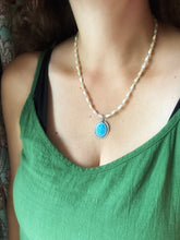 Load image into Gallery viewer, Enameled cross on a beaded mother of pearl and crystal necklace.