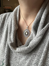 Load image into Gallery viewer, Layered silver and mother of pearl eye pendant