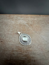 Load image into Gallery viewer, Layered silver and mother of pearl eye pendant