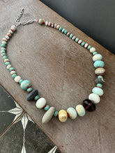 Load image into Gallery viewer, Beachy Bead collection hand knotted on red silk.