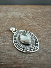 Load image into Gallery viewer, Layered silver and mother of pearl eye pendant