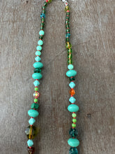 Load image into Gallery viewer, Vintage glass bead silk knotted necklace in greens and oranges
