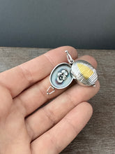 Load image into Gallery viewer, Textured oval flower locket.