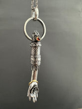 Load image into Gallery viewer, Hand pendant with a flower on the palm and gold accents