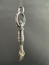 Load image into Gallery viewer, Hand pendant with a flower on the palm and gold accents