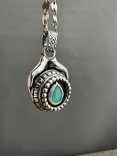 Load image into Gallery viewer, Hands holding a Peruvian Opal