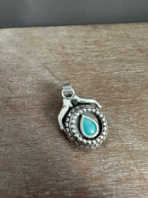 Load image into Gallery viewer, Hands holding a Peruvian Opal