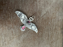 Load image into Gallery viewer, Large stamped bird pendant with a Winza Sapphire and garnet.