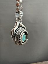 Load image into Gallery viewer, Hands holding a Peruvian Opal