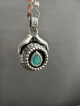 Load image into Gallery viewer, Hands holding a Peruvian Opal