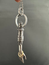 Load image into Gallery viewer, Hand pendant with a flower on the palm and gold accents