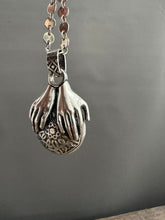 Load image into Gallery viewer, Hands holding a Peruvian Opal