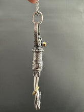 Load image into Gallery viewer, Hand pendant with a flower on the palm and gold accents