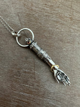 Load image into Gallery viewer, Hand pendant with a flower on the palm and gold accents