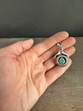 Load image into Gallery viewer, Hands holding a Peruvian Opal