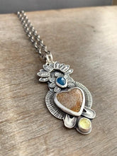Load image into Gallery viewer, Fossilized coral sacred heart pendant