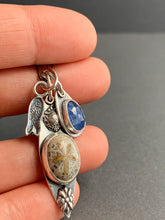 Load image into Gallery viewer, Fossilized sand dollar and kyanite charm necklace