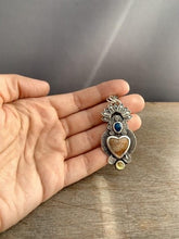 Load image into Gallery viewer, Fossilized coral sacred heart pendant
