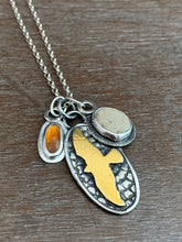 Load image into Gallery viewer, Garnet and beach stone with a gold hawk charm collection