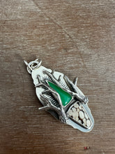 Load image into Gallery viewer, Peanut wood and chrysoprase antler medallion