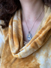 Load image into Gallery viewer, Golden eye and sun pendant
