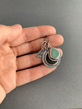 Load image into Gallery viewer, Lake Erie beach stone charm necklace, with a teal ceramic shard, and tiny fish charms